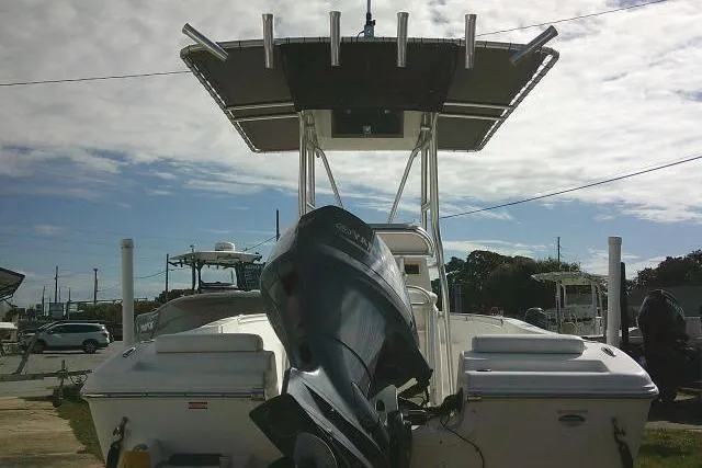 Slide: The Image of 2014 Tidewater 196 CC Adventure boat with outboard motor and T-top. - 7