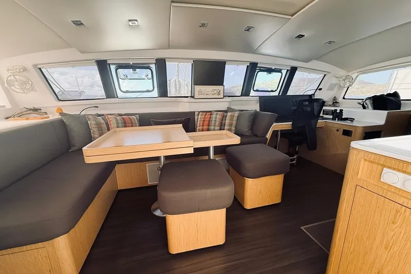 Slide: The Image of Interior of 2021 Outremer 51 catamaran with modern seating and navigation area. - 18