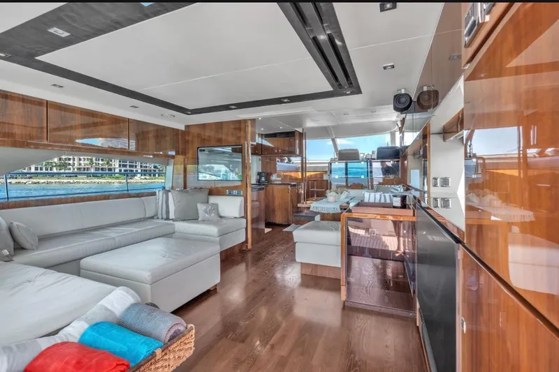 Slide: The Image of Luxurious interior of 2013 Fairline Squadron 66 yacht with modern furnishings and panoramic windows. - 12