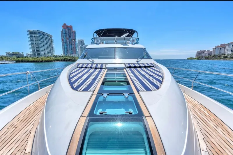 Slide: The Image of Luxury Fairline Squadron 66 yacht cruising near city skyline, 2013 model. - 17