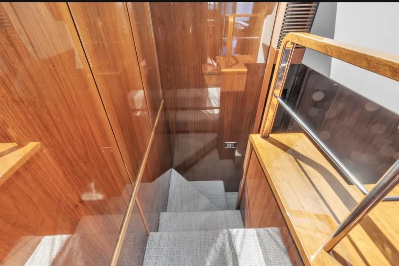 Slide: The Image of Interior staircase of 2013 Fairline Squadron 66 yacht with wooden finish. - 22