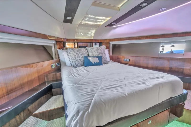 Slide: The Image of Luxurious bedroom interior of 2013 Fairline Squadron 66 yacht with modern design and cozy bedding. - 24