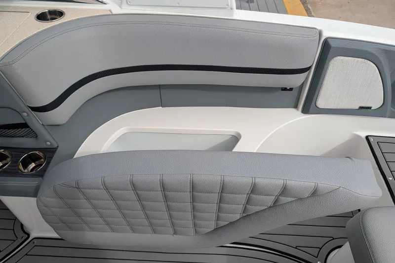 Slide: The Image of 2021 Cobalt R7 boat interior with gray seating and cup holders. - 13