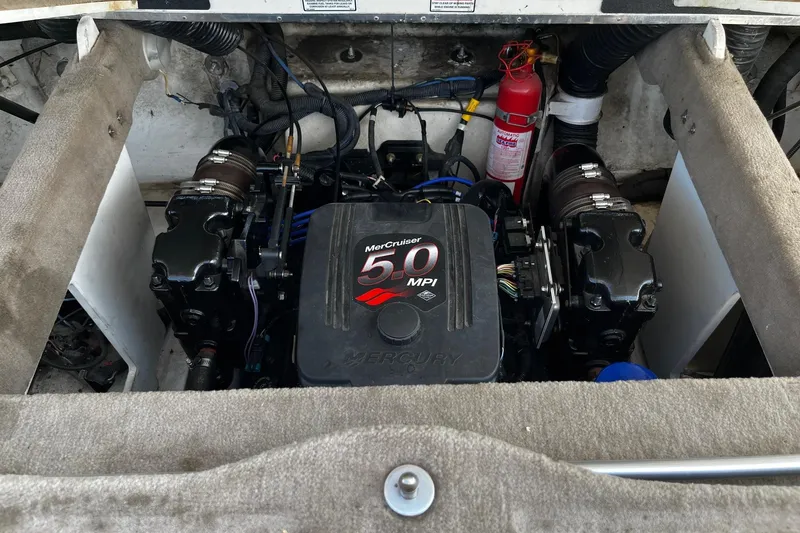 Slide: The Image of Engine compartment of 2003 Sea Ray 240 Bow Rider with MerCruiser 5.0 MPI engine. - 9