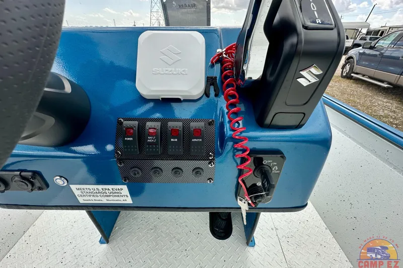 Slide: The Image of Control panel of 2026 SeaArk C1074 Shadow 18TCC boat with Suzuki components. - 19