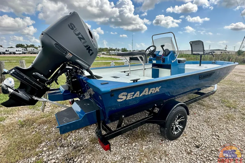 Slide: The Image of 2026 SeaArk C1074 Shadow 18TCC boat with Suzuki engine on a trailer. - 4