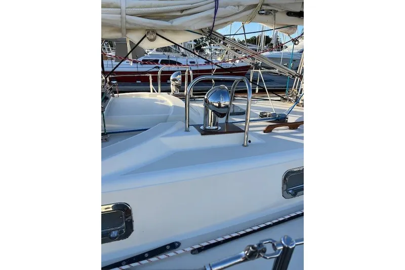 Slide: The Image of 1979 Tartan 37C sailboat deck with polished metal fittings and rigging. - 57