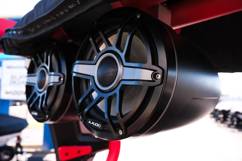 Slide: The Image of 2022 Supra SL boat speakers, JL Audio, mounted under canopy. - 15