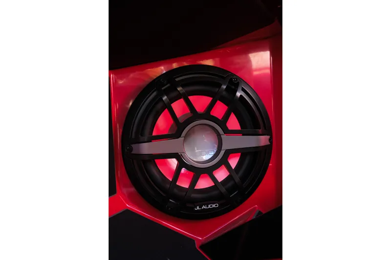 Slide: The Image of Red-lit JL Audio speaker in 2022 Supra SL. - 24