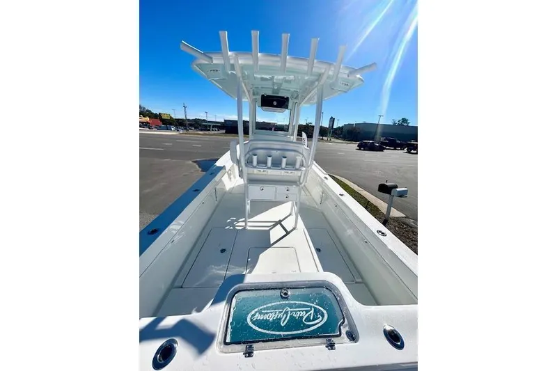 Slide: The Image of 2026 Pair Customs 24 Center Console DV Offshore boat, sleek design, sunny day. - 3