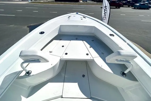 Slide: The Image of 2026 Pair Customs 24 Center Console DV Offshore boat, white deck, street background. - 8