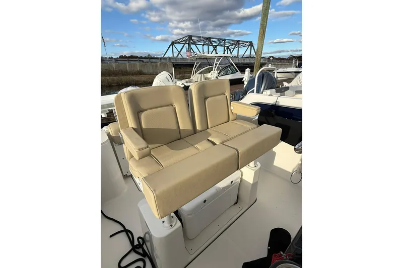 Slide: The Image of Display screen of a 2021 Pursuit C 238 Center Console showing trip and total hours. - 14