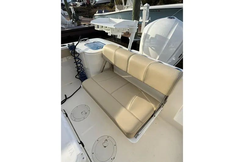 Slide: The Image of 2021 Pursuit C 238 Center Console boat with Yamaha outboard engine at marina. - 8