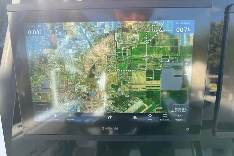 Slide: The Image of Garmin GPS display on 2014 Sea Fox 256 Commander showing detailed map view. - 20