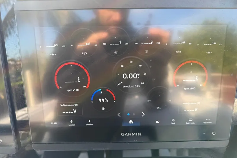 Slide: The Image of Garmin display on 2014 Sea Fox 256 Commander showing engine metrics and GPS speed. - 21