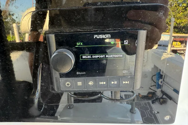 Slide: The Image of Fusion audio system on 2014 Sea Fox 256 Commander boat, displaying Bluetooth selection. - 22