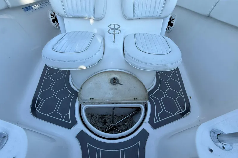 Slide: The Image of 2014 Sea Fox 256 Commander boat interior with seating and anchor storage. - 47