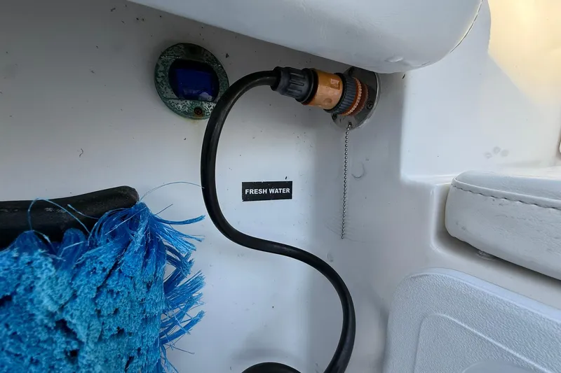 Slide: The Image of Fresh water connection on 2014 Sea Fox 256 Commander boat interior. - 59