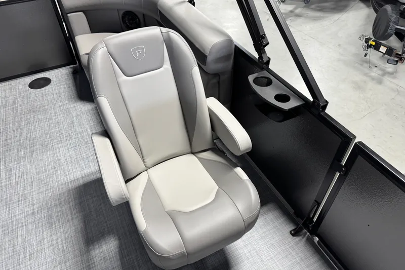 Slide: The Image of Premier 200 Sunscape RF 2026 boat seat with armrests and cup holders, gray interior. - 12