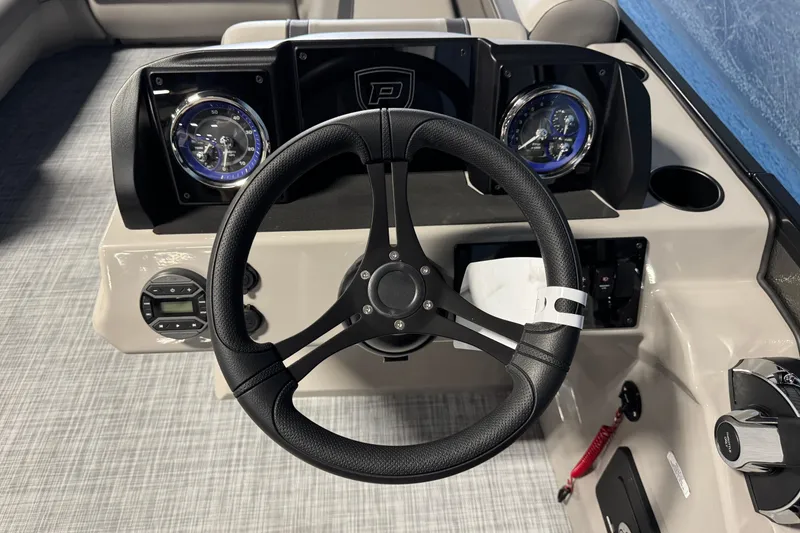 Slide: The Image of Steering wheel and dashboard of 2026 Premier 200 Sunscape RF boat. - 13