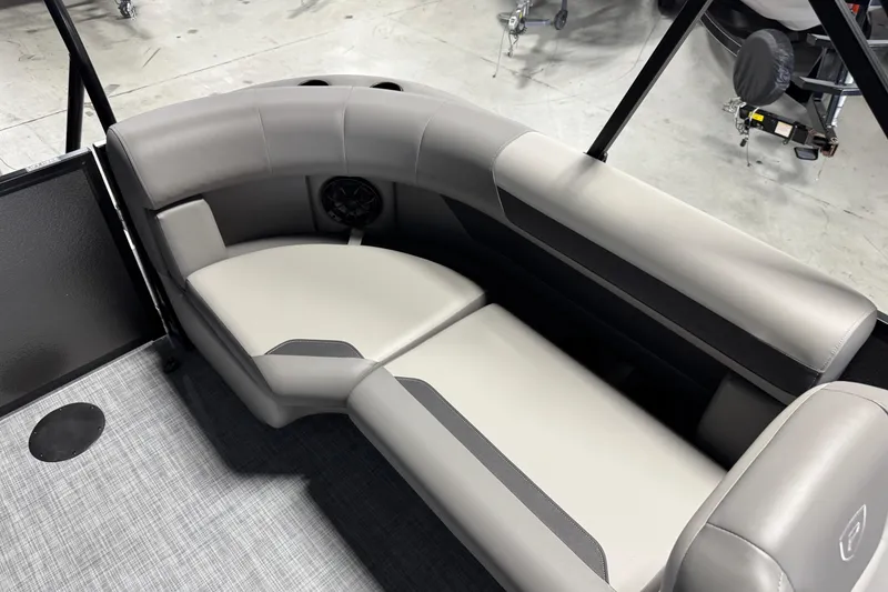 Slide: The Image of Luxurious seating in 2026 Premier 200 Sunscape RF boat, featuring sleek gray upholstery. - 16