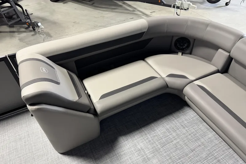 Slide: The Image of Luxurious seating in 2026 Premier 200 Sunscape RF boat, featuring sleek gray upholstery. - 9