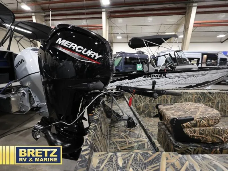 Slide: The Image of 2025 Sportsman 1866 T boat with Mercury engine in showroom. - 13