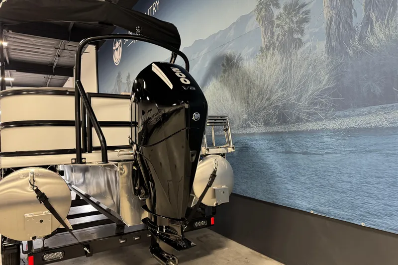 Slide: The Image of 2026 Premier 220 Sunscape RF boat with powerful 200 V6 engine, displayed indoors. - 5