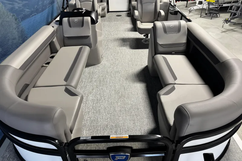 Slide: The Image of Interior of 2026 Premier 220 Sunscape RF pontoon boat with luxurious seating. - 7