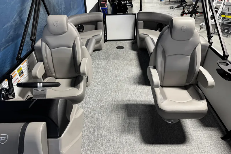 Slide: The Image of 2026 Premier 220 Sunscape RF boat interior with plush seating and modern design. - 8