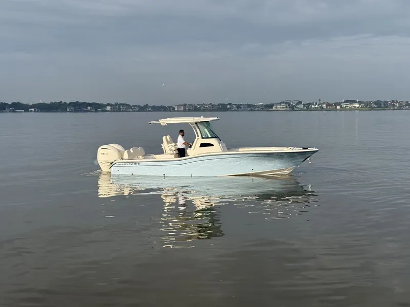 Slide: The Image of Grady-White 281 Coastal Explorer 2026 on calm waters. - 27