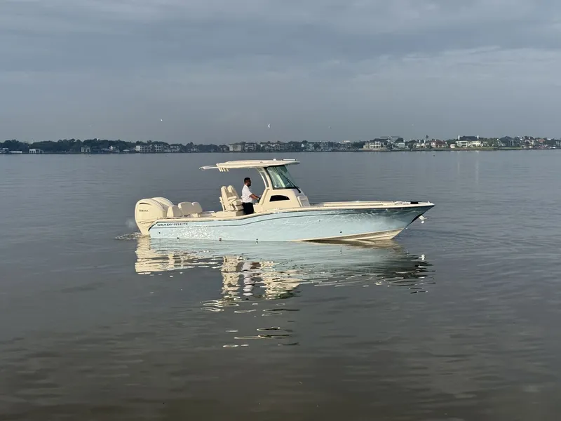 Slide: The Image of 2026 Grady-White 281 Coastal Explorer on calm waters. - 28