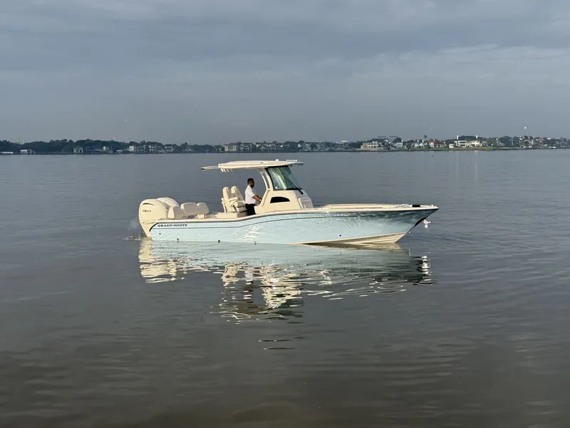 Slide: The Image of 2026 Grady-White 281 Coastal Explorer on calm waters. - 29