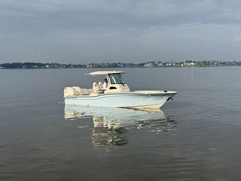 Slide: The Image of 2026 Grady-White 281 Coastal Explorer with dual outboard engines. - 32