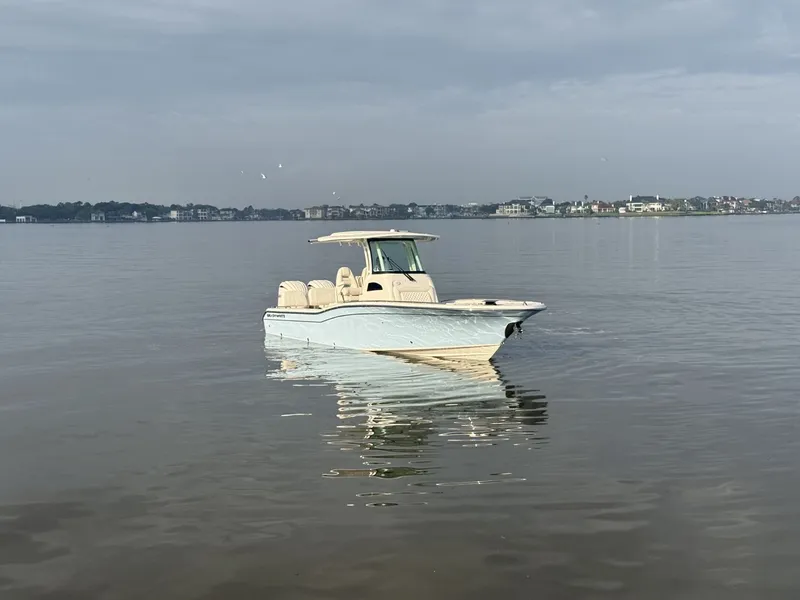Slide: The Image of Grady-White 281 Coastal Explorer 2026 with twin outboard engines. - 37