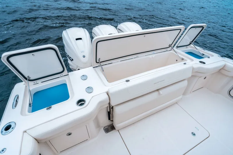 Slide: The Image of 2027 Grady-White Canyon 386 with spacious deck and multiple storage compartments. - 11