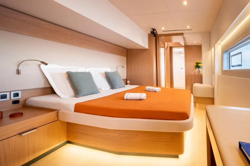 Slide: The Image of Luxurious Bali 5.8 yacht bedroom, 2026 model, featuring modern design and cozy ambiance. - 21