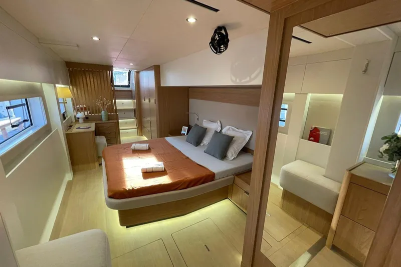Slide: The Image of Luxurious Bali 5.8 yacht bedroom interior, 2026 model, featuring modern design and ambient lighting. - 22