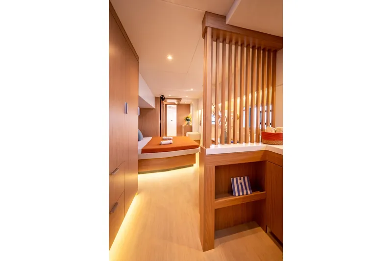 Slide: The Image of Luxurious interior of 2026 Bali 5.8 yacht, featuring modern wood finishes and ambient lighting. - 23