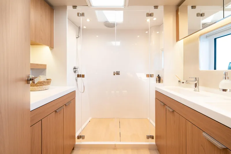 Slide: The Image of Modern bathroom in 2026 Bali 5.8 yacht with wood cabinets and glass shower. - 24