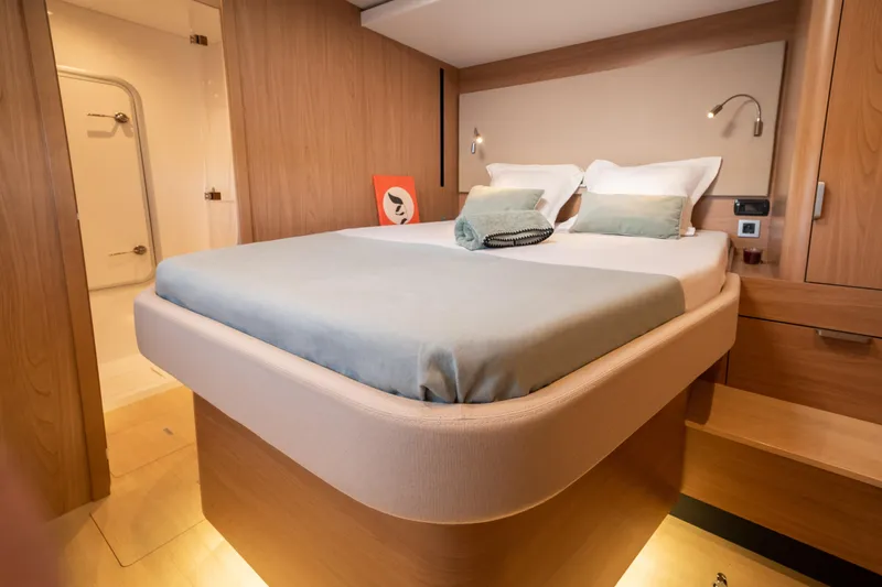 Slide: The Image of Luxurious cabin interior of 2026 Bali 5.8 yacht with modern design and cozy bedding. - 26