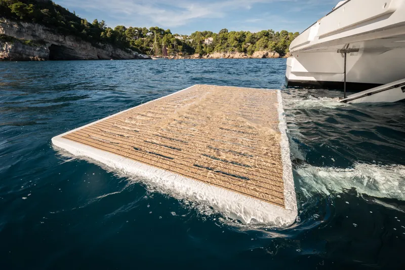 Slide: The Image of Luxury yacht Bali 5.8 (2026) with extended swim platform on serene blue water. - 30