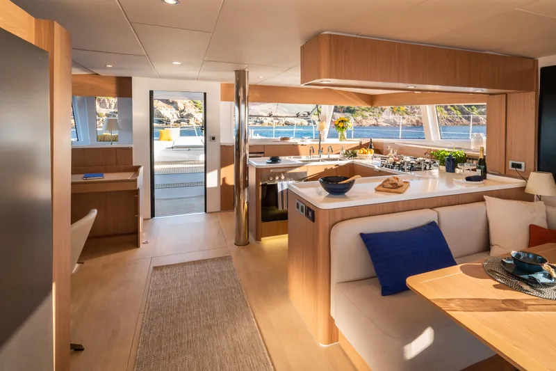 Slide: The Image of Luxurious interior of 2026 Bali 5.8 yacht with modern kitchen and seating area. - 6