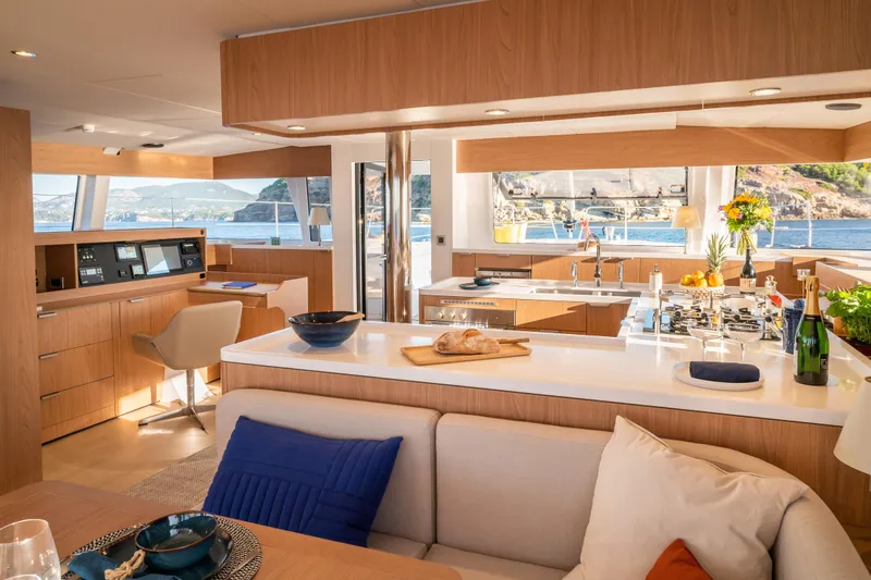 Slide: The Image of Luxurious interior of 2026 Bali 5.8 yacht with modern kitchen and scenic ocean view. - 7