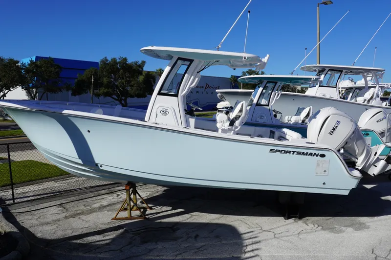 The Image of 2026 Sportsman Open 232 Center Console boat displayed outdoors. - 0