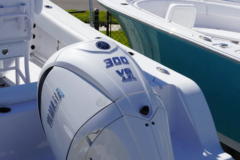 Slide: The Image of 2026 Sportsman Open 232 Center Console with Yamaha 300 V6 outboard engine. - 1