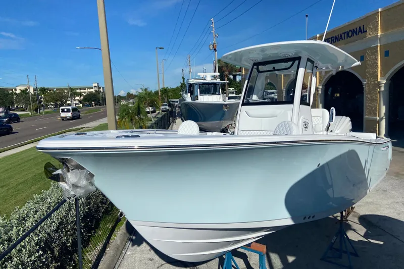 The Image of 2026 Sportsman Heritage 231 Center Console boat displayed outdoors. - 0