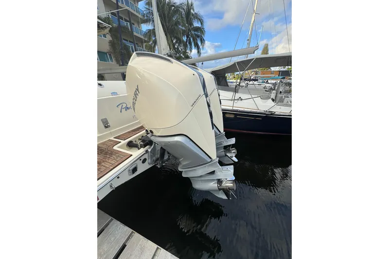 Slide: The Image of 2023 Chris-Craft Catalina 30 with powerful Mercury outboard engines docked at marina. - 13