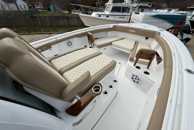 Slide: The Image of 2026 Everglades 315 Center Console boat with luxurious seating and modern design. - 19