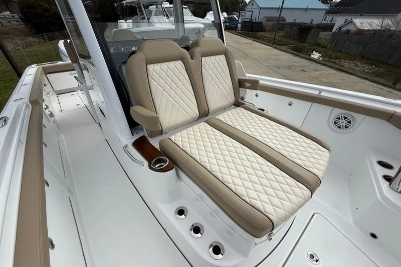 Slide: The Image of 2026 Everglades 315 Center Console boat with luxurious seating and modern design. - 20